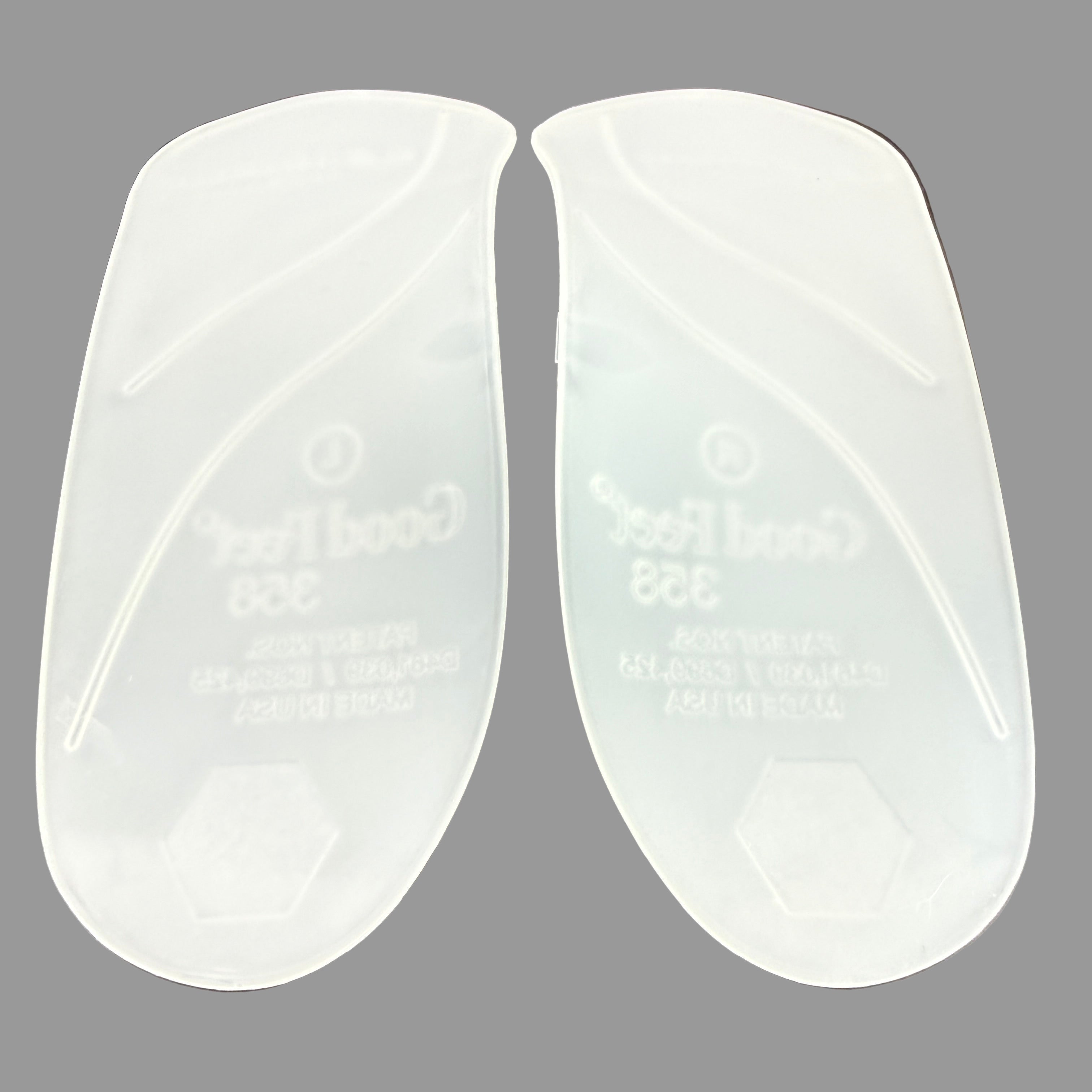 Pair of white shoe inserts on a gray background - flex 