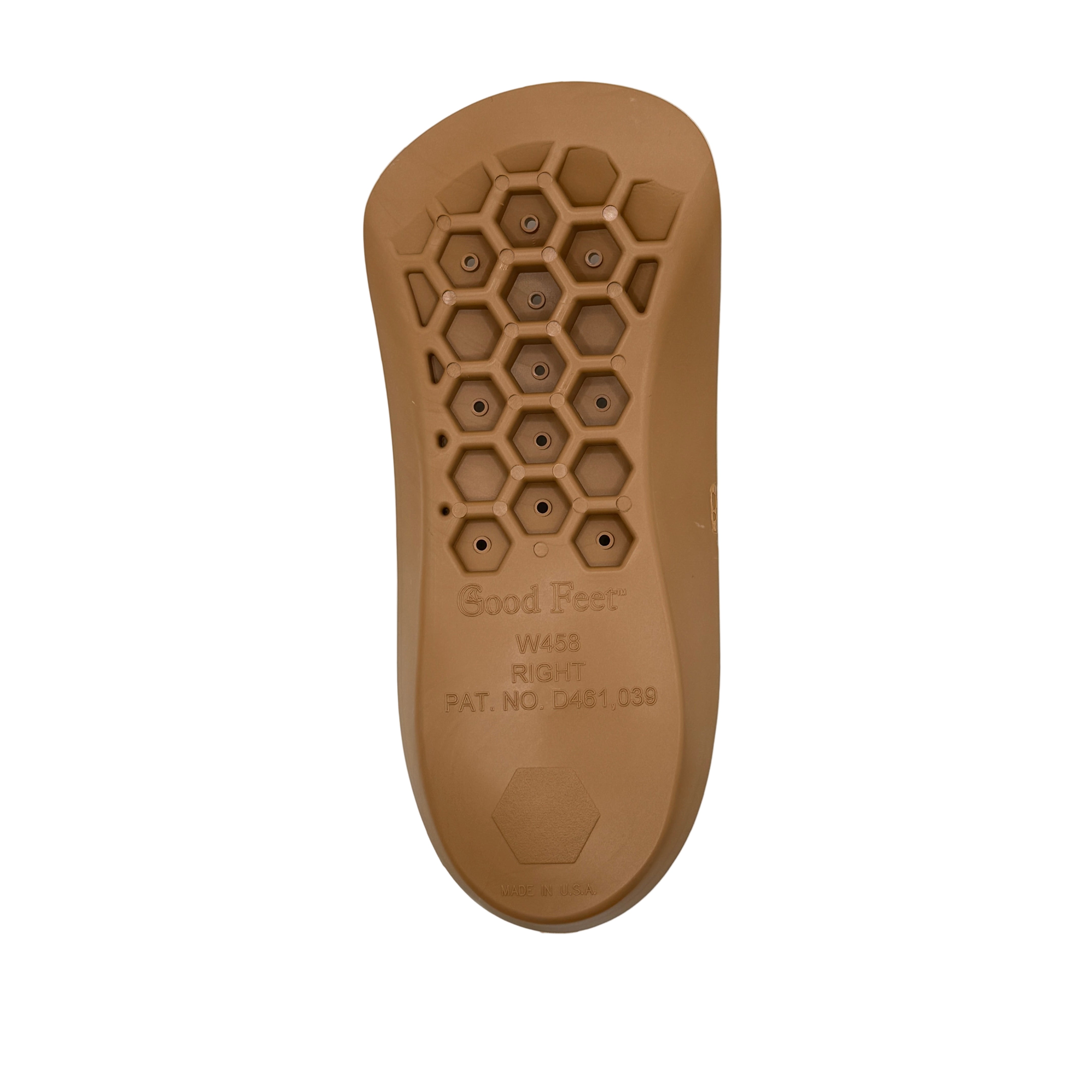 Brown shoe sole with honeycomb pattern on a white background